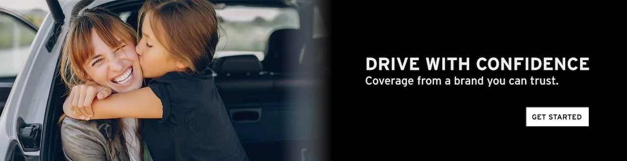A happy woman in a car gets a kiss from a child, with 'DRIVE WITH CONFIDENCE' text and 'GET STARTED' button.